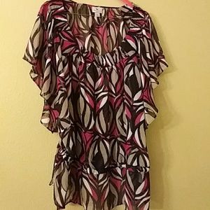 Very dressy women's blouse bought at JCPennys. Bun